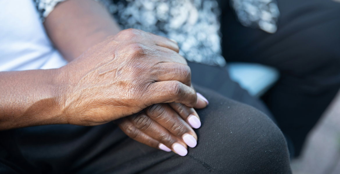 Two elderly hands entertwined by Nappy via Unsplash+