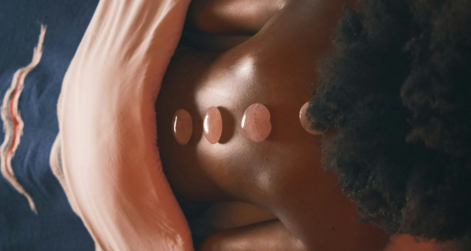 Woman under blanket by Taylor Heery via Unsplash