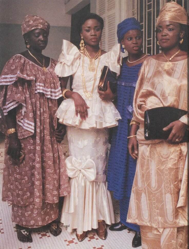 Old photo of four women wearing traditional attires via Pinterest