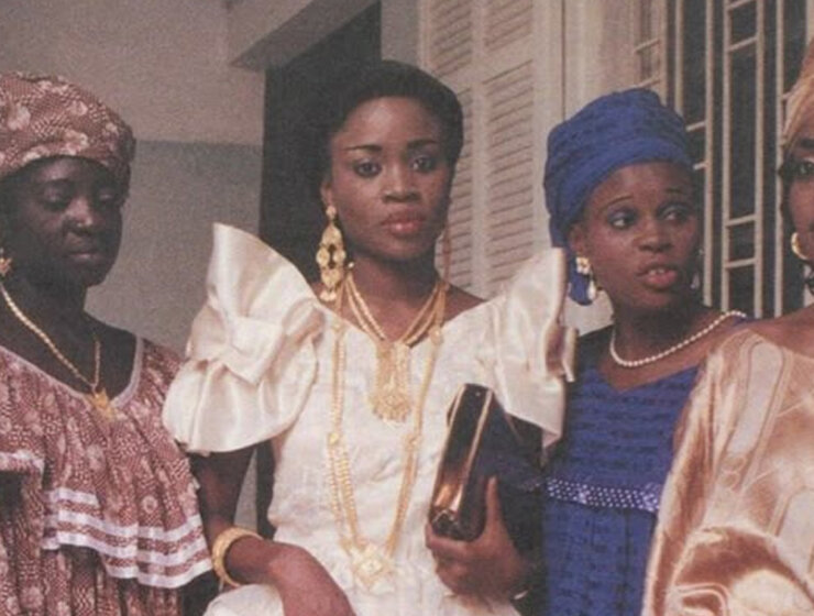 Old photo of four women wearing traditional attires via Pinterest