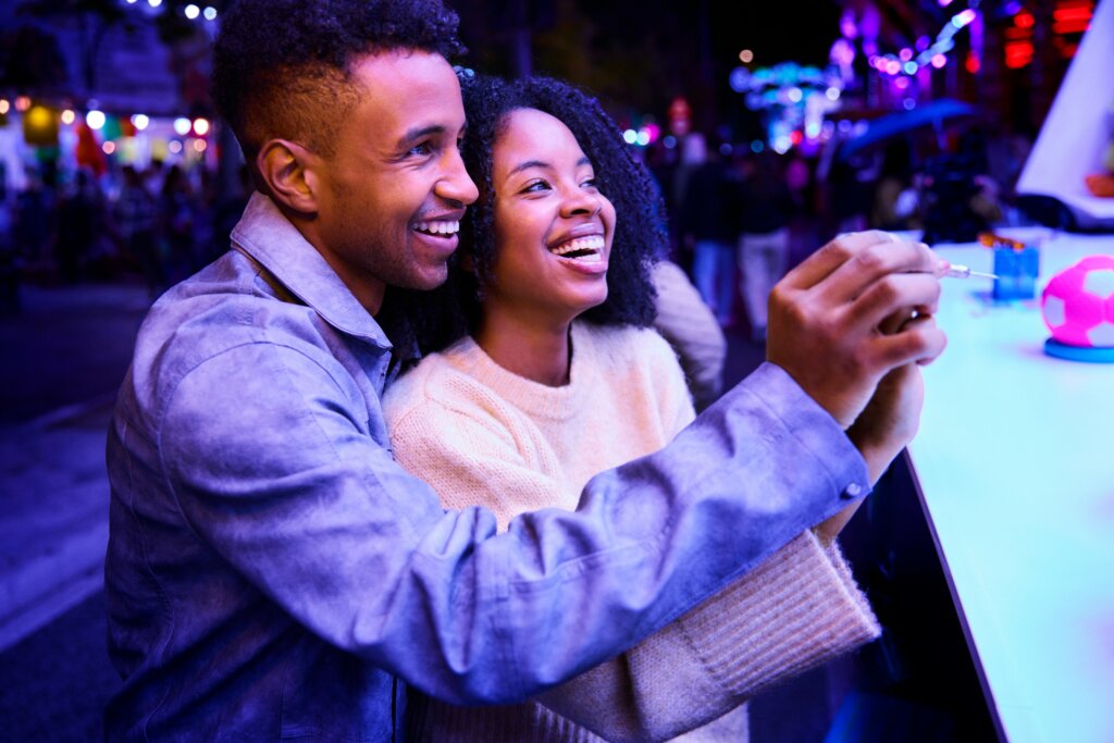 Two lovers smiling on a date night by Edward Cordoba Bastidas via Unsplash