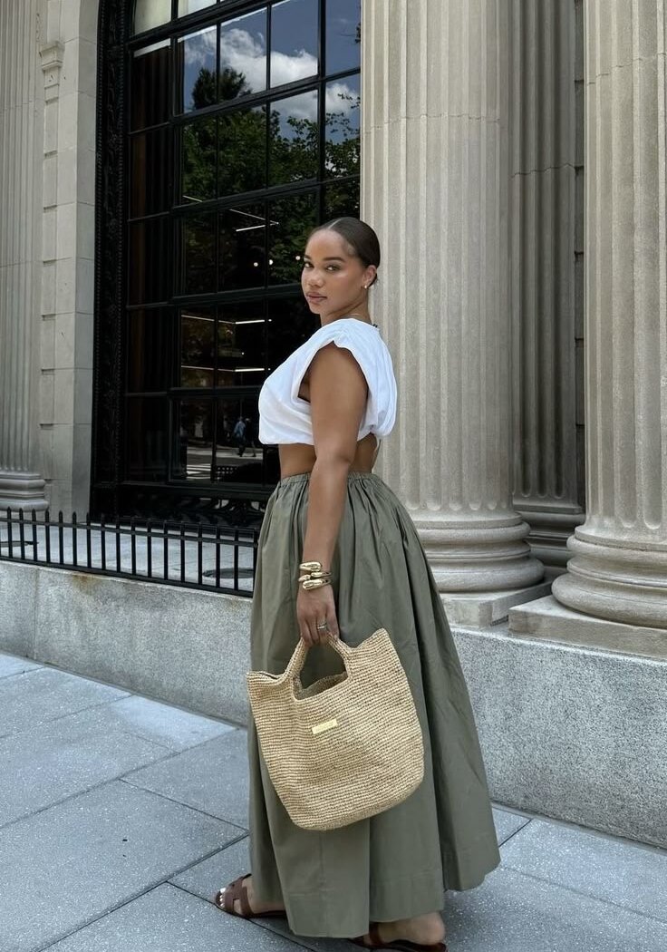 Black woman with cotton outfit via Pinterest (original creator unknown). If this is your work, please contact us for credit.