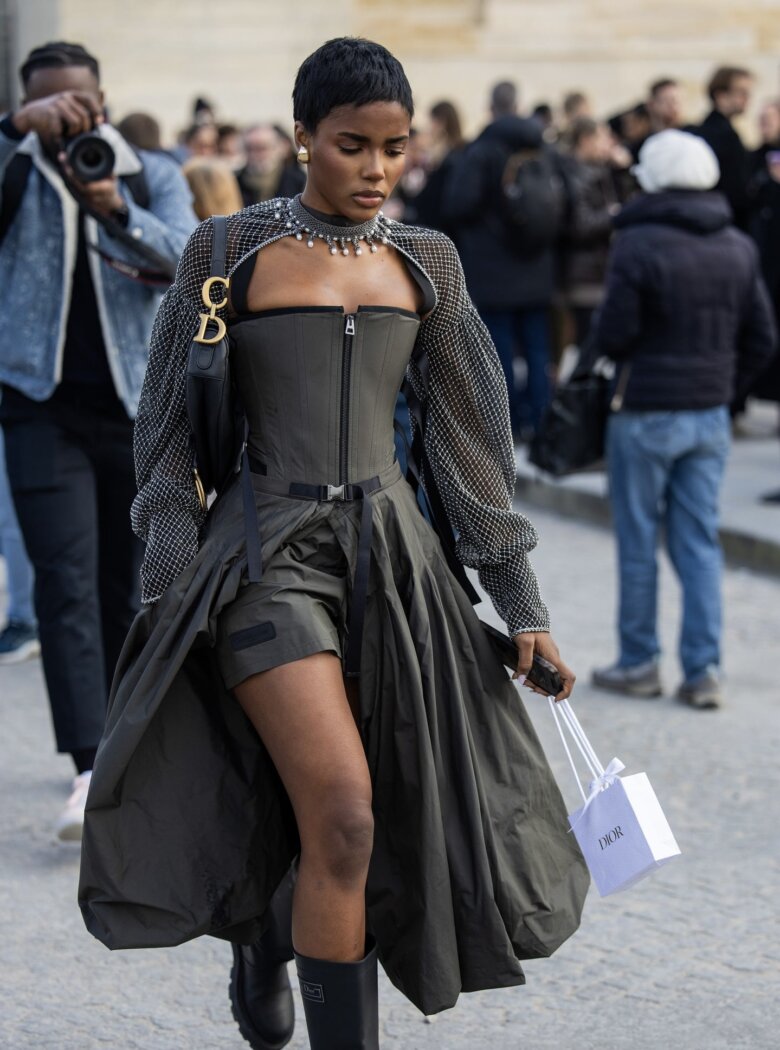 Eva Apio rocking a sleek, stylish pixie cut, captured by CHRISTIAN VIERIG via GETTY IMAGES