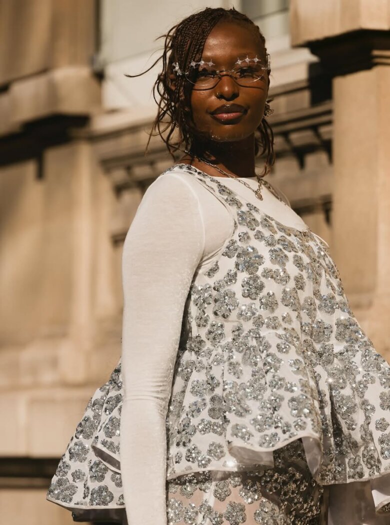 Short curly French braids by RAIMONDA KULIKAUSKIENE via GETTY IMAGES